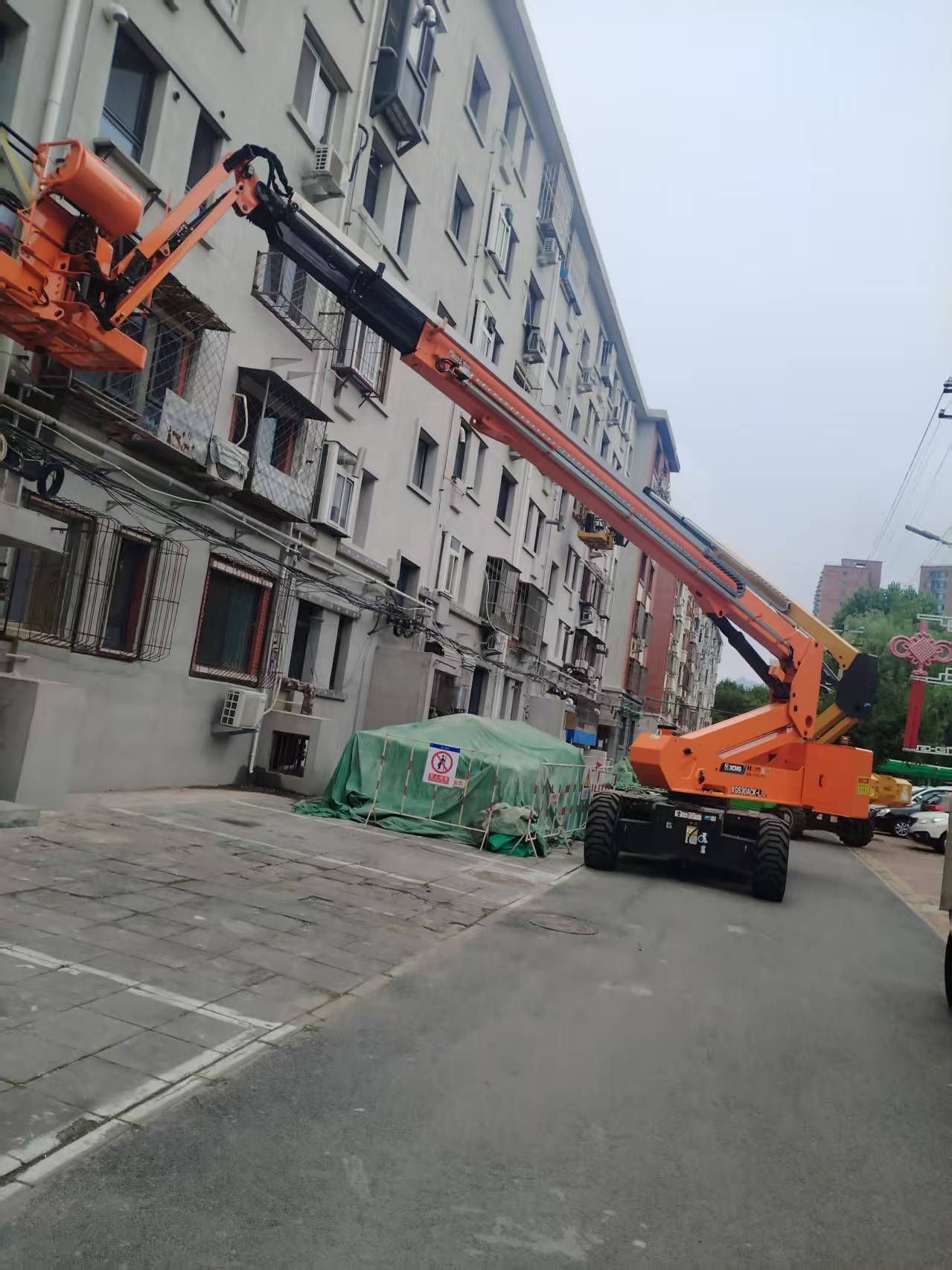 诠释城市更新厚度！7790必发集团中国高机画出老旧幼区刷新“同心圆”